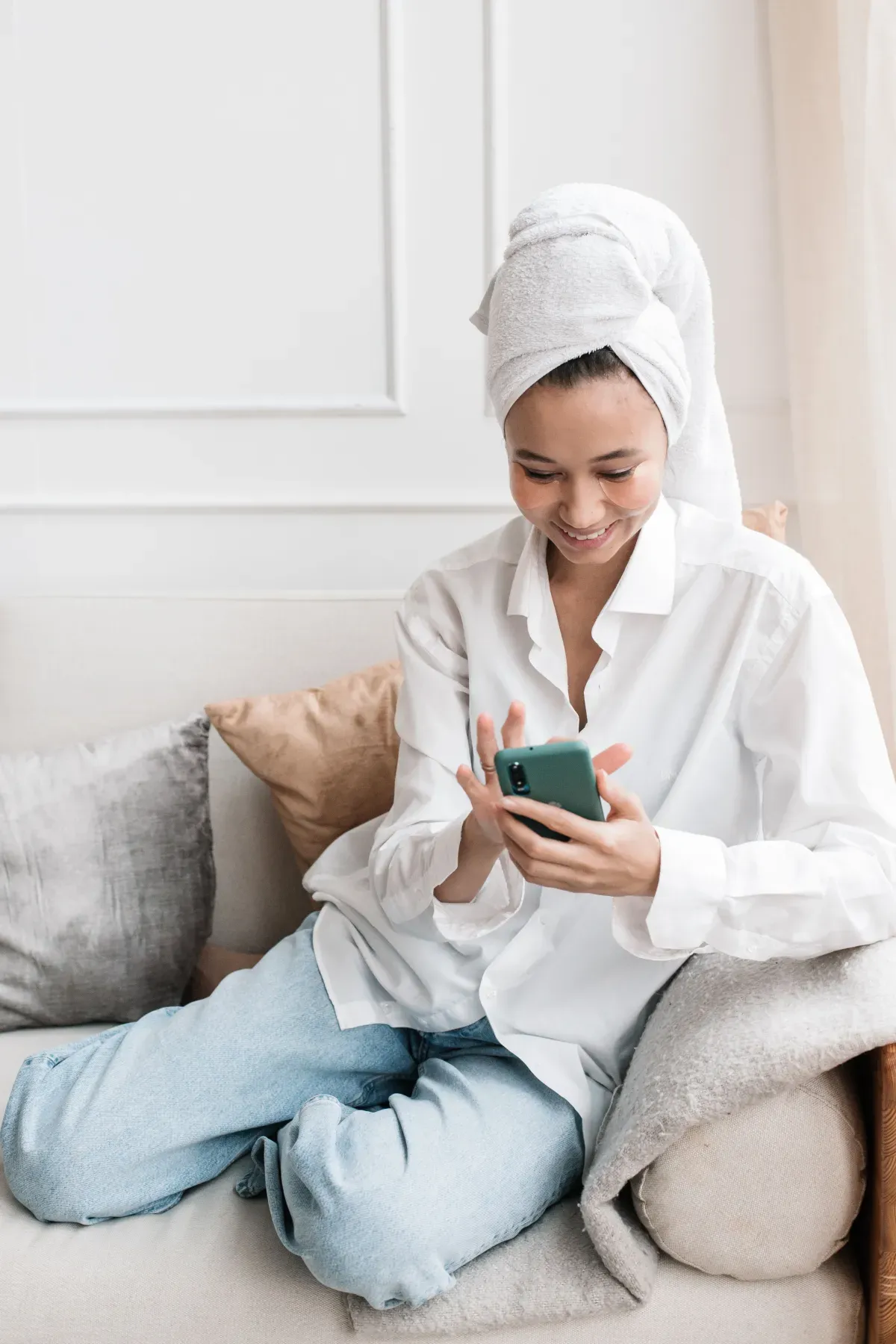 Person relaxing with a phone, using an app like Finch for self-care