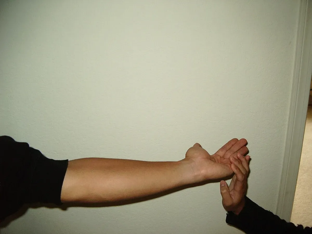 A wrist and forearm stretch