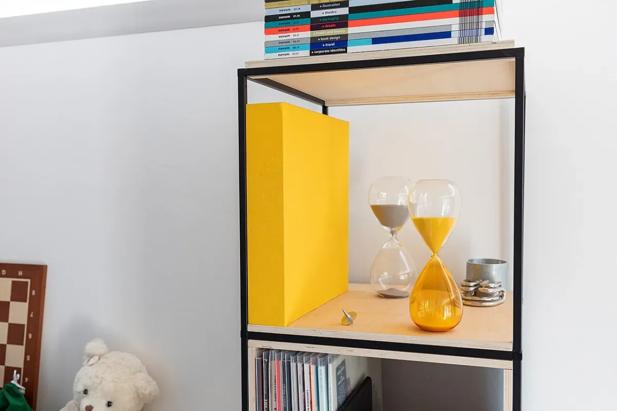 Two hourglasses on a shelf, a reminder of focus-timer apps that replace Habitica for deep work