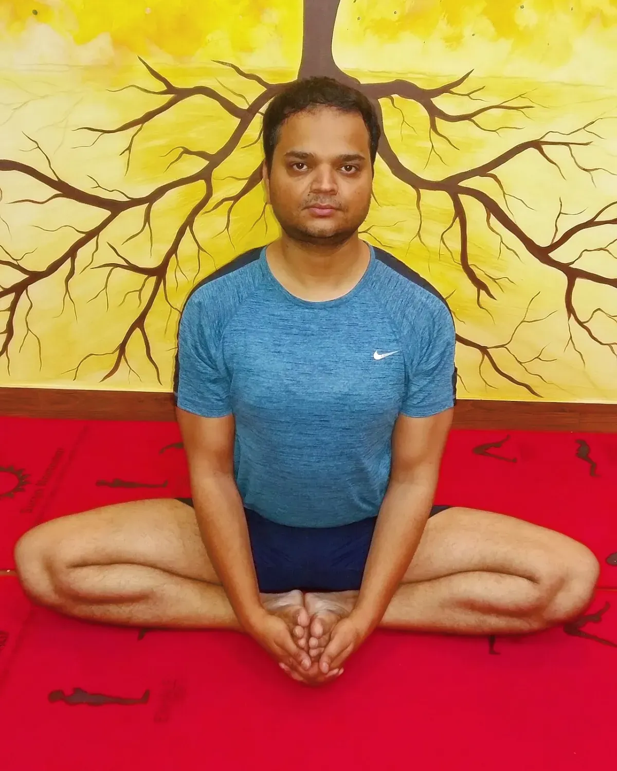 Butterfly stretch for the inner hip, soles of the feet together