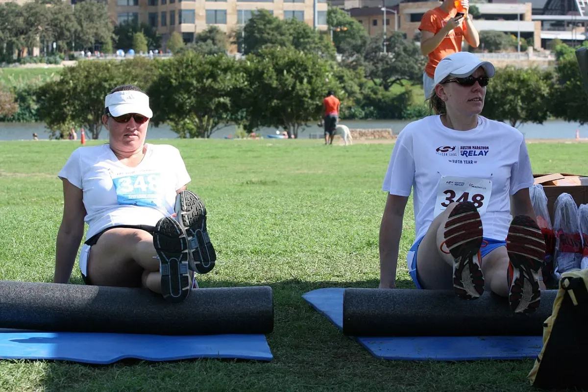 Foam rolling the outer thigh along the IT band